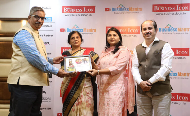 Nutramore receiving the Emerging Brand Award from Business Icon in August 2023