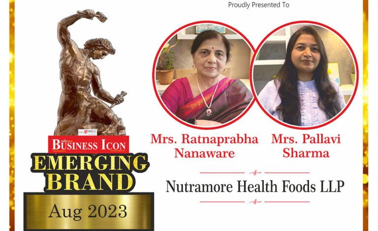 Nutramore representative receiving the Emerging Brand Award from Business Icon in August 2023